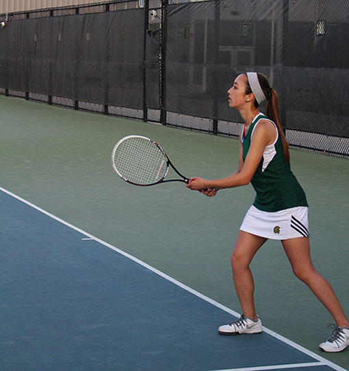 Tennis teams split with City High