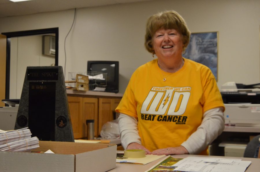 Athletic secretary Marcy Wardenburg spends last day at West High