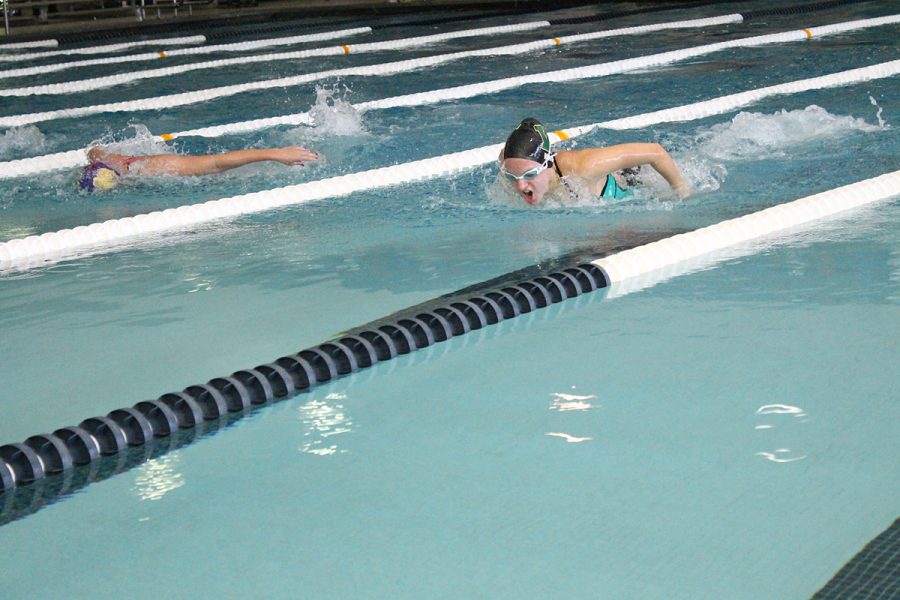 Melanie Housenga 18 swims 100 butterfly 