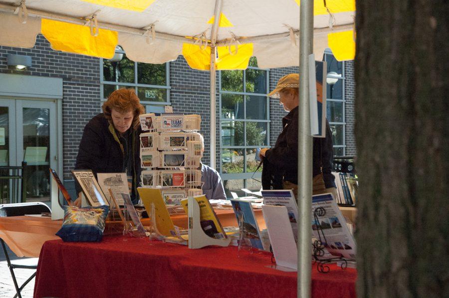 A booth offers newly published books.