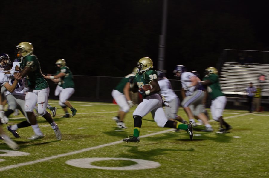 Davonte Levy '17 runs the ball past the 20 yard line. 