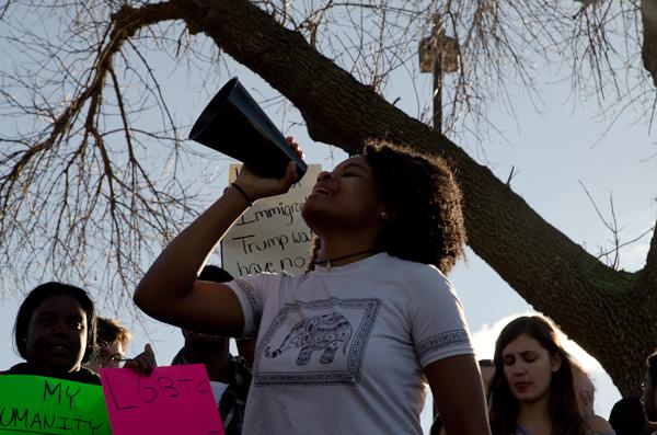Jade Merriwether '17 leads a chant for the protestors. 