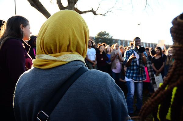 Forming a circle, students voice their experiences with discrimination.