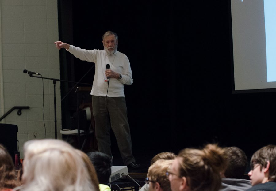 Pointing towards the door, Frieder describes the impact of the Holocaust. "Every minute, the door will open, and a Holocaust victim will come. And that will happen every minute of every hour, twenty-four hours a day, seven days a week, constantly, until six million have passed."