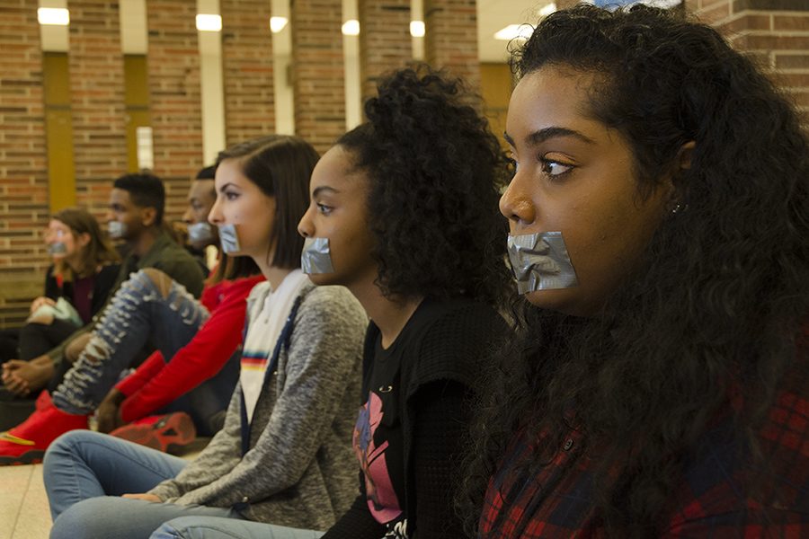 Cousins Wala Siddig '18 and Safeya Siddig '18 sit with each other.