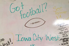 A white board in Van Allan Elementary school wishing West High luck in the State Football Championship game on Nov. 18.
