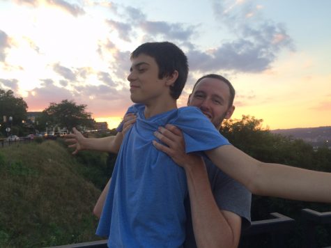 Robert Walling 18 recreating the Lion King scene in Pittsburgh with youth leader Kevin Graf