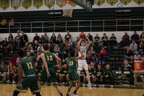 Photo gallery: boys basketball defeats Dubuque Hempstead