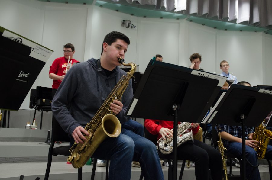 Dominic Weston '18 rehearses his solo in the SEIBA Jazz Band before lunch in the Choral rehearsal room.