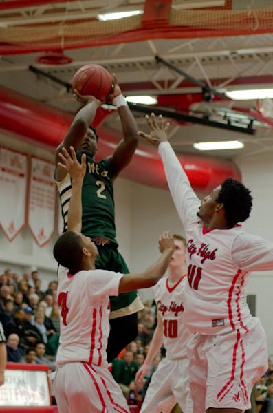 In the first half, Devontae Lane '17 goes for a two pointer against City High School. 