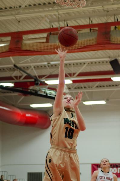 After Cailyn Morgan '19 passes a defensive rebound to Ali Tauchen '17, she takes it up for two points at the end of the first half. 