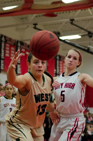 Rachel Saunders '18 keeps the ball from going out of bounds while on the offensive against City High's Sydney Schroder '17.