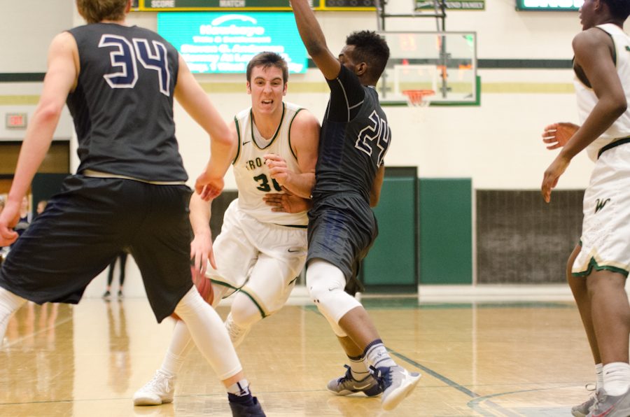 Connor McCaffery'17 drives past Pleasant Valley's defense in the second half of the game. 