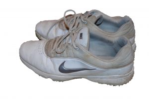 Golf shoes have cleats on the bottom and lots of traction, making the golfer as stable as possible.