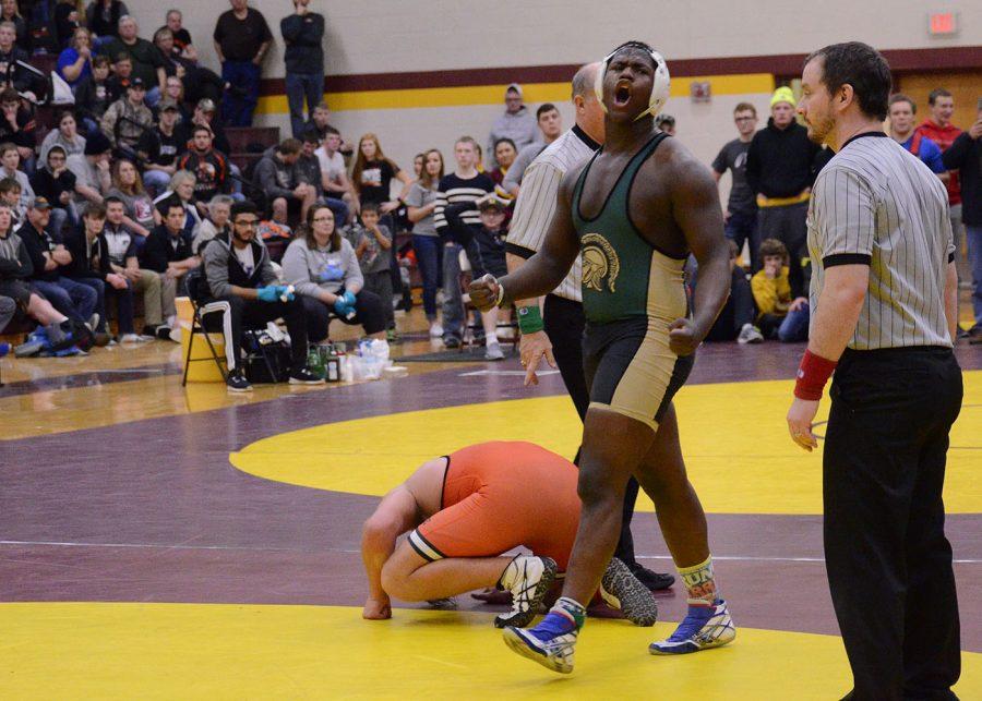 Guy Snow 18 celebrates his win in the true second place match at the Class 3A District 5 wrestling tournament. Snow will advance to his first Iowa High School State Championships.