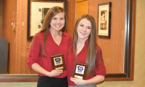 Anna Jacoby and Hannah Luce pose with their awards from BPA state. 