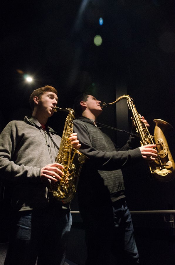 Juniors Dominic Weston and Chad Johnson light up the Voxman Music Building together in downtown Iowa City. 