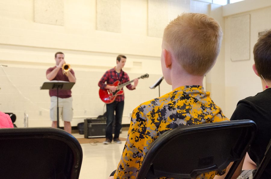 Student musicians perform during the Booster Club Pancake Day in the West High Cafeteria on Sat. April 8 as a part of an annual fundraiser for the Iowa City School District's athletic program. 