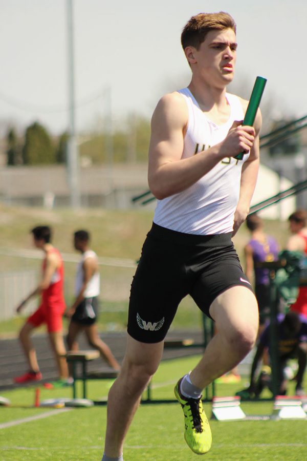 Ethan McAreavy '18 starts off the varsity 4x200 meter relay, West placed eighth. 