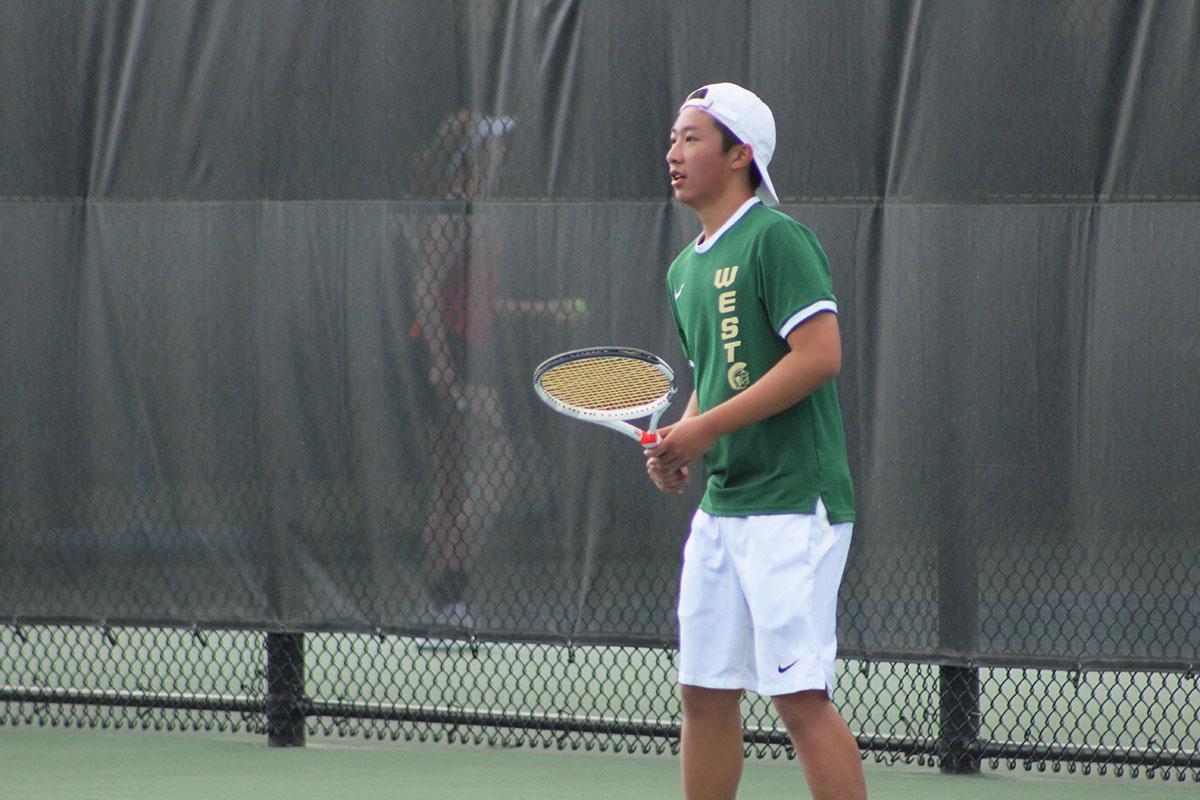 Sam Shin '19 waits for his opponent to serve the ball.  