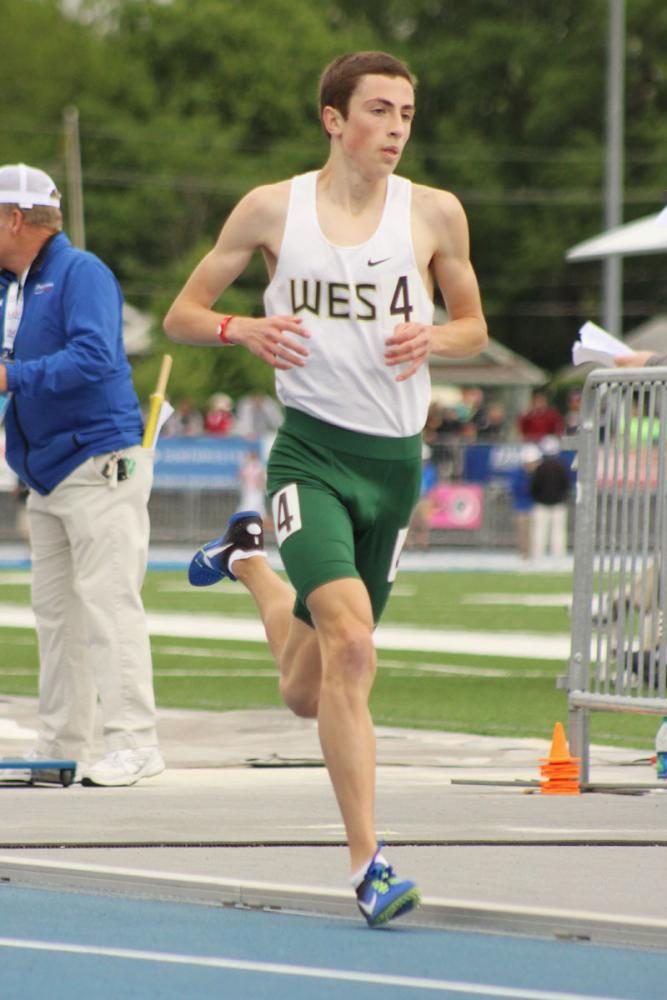 Kolby Greiner '19 runs during the 3,200 meter run. He placed 3rd overall with a personal best time of 9:13.35. 