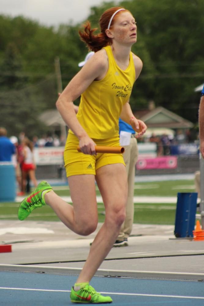 Claire Ronnebaum '18 starts the second leg of the 4x800 meter relay.