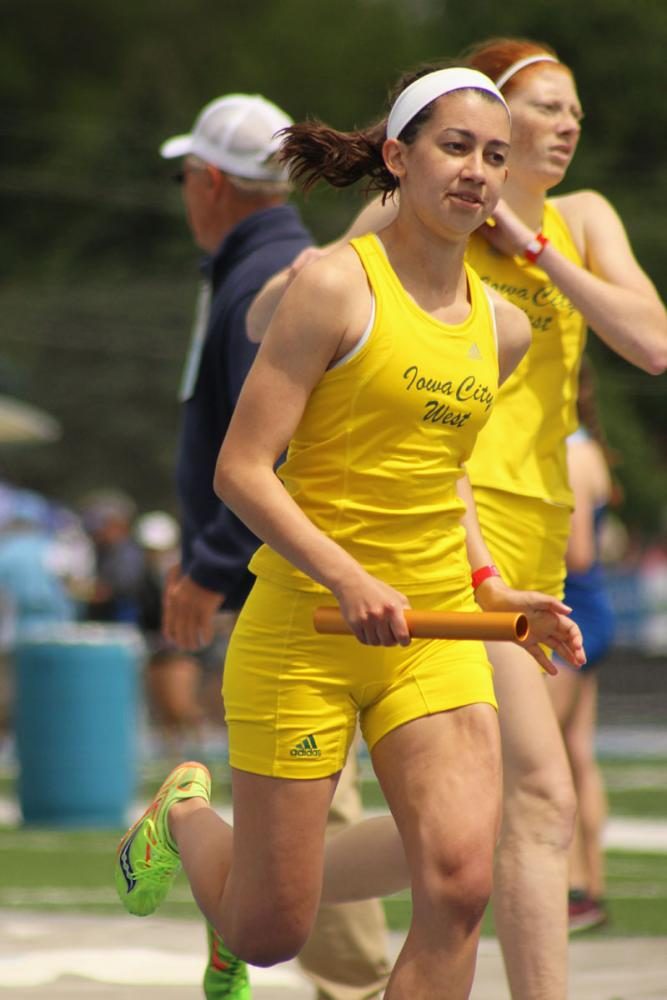 Olivia Moore '17 runs the 4x800 relay on May 18th.