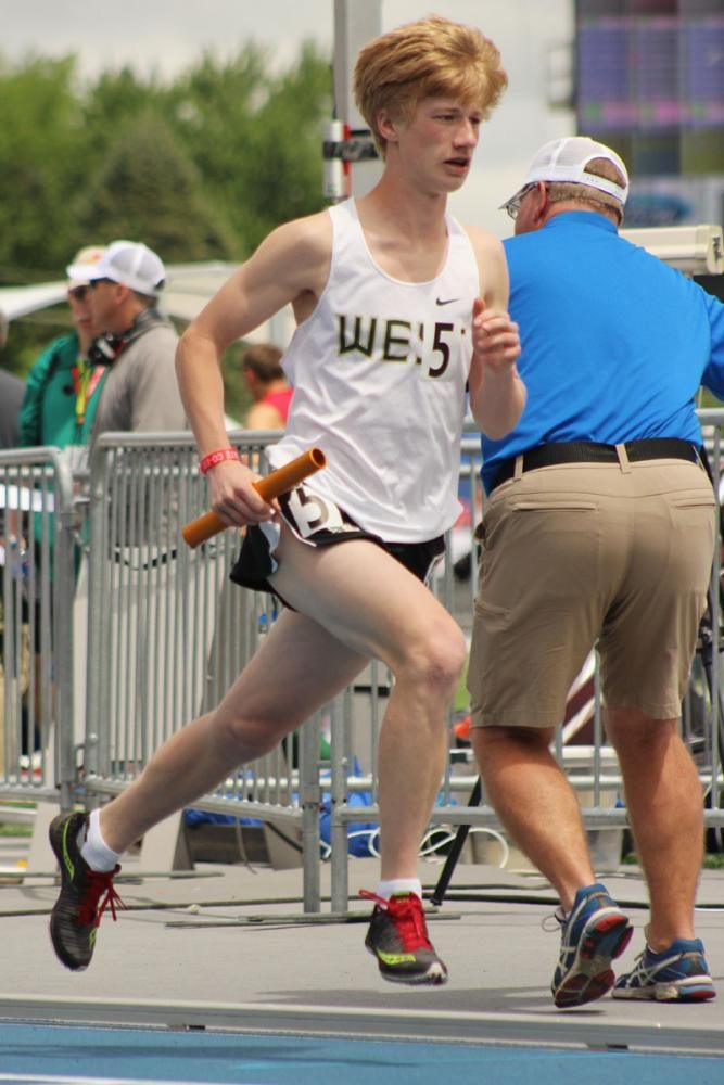 Ethan Goers '18 finishes the last leg of the boys 4x800 meter relay, where the team ran 8:18.31.