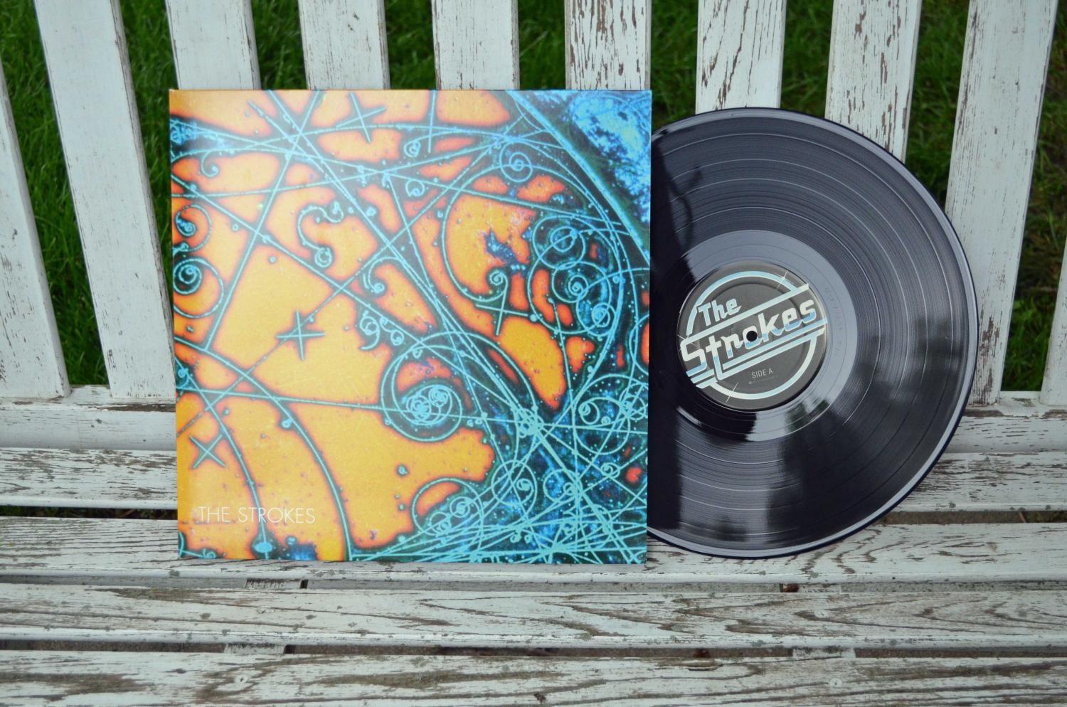 This+is+the+album+is+this+it+by+the+Strokes.+They+are+a+successful+American+rock+band.+I+highly+recommend.