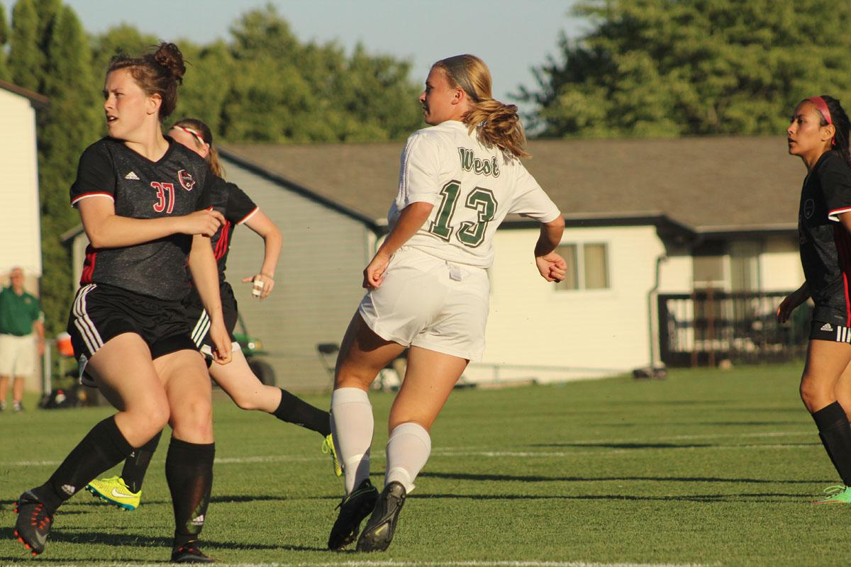 Emma Cooper '17 shoots a goal during the second half of the game.