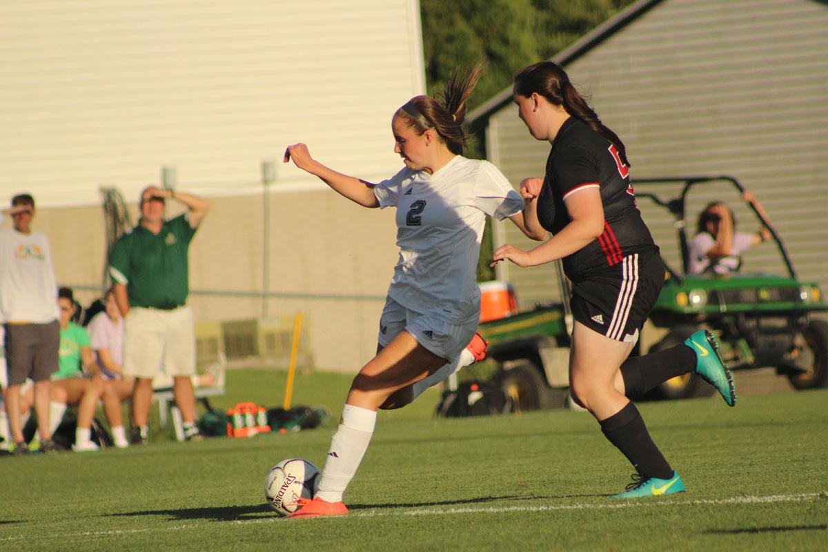 Marnie Vonderhaar '19 attempts to shoot a goal during the second half of the game. 