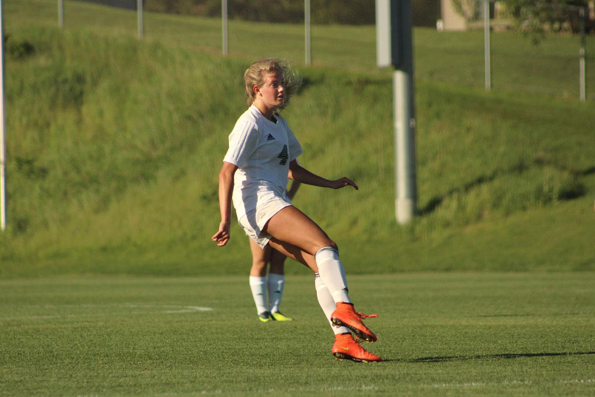 Regan Steigleder '17 shoots a goal in the first half of the game. 