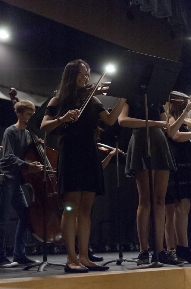 Showcasing Libertys new stage, Mya Nguyen 19 performs with a small portion of Libertys orchestra, led by conductor Annie Savage on Aug. 12 in North Liberty. 