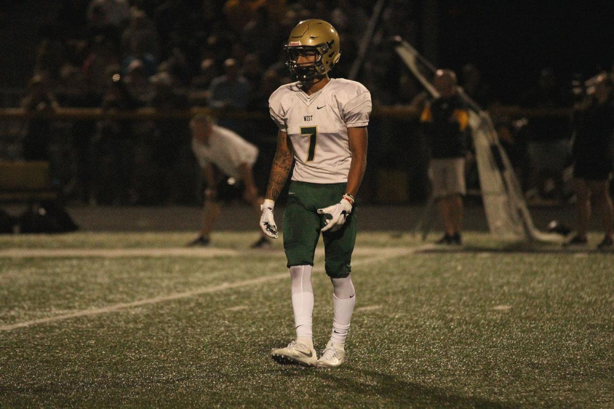 Traevis Buchanan '18 waits for a kickoff from Southeast Polk on Friday, Aug. 25. 