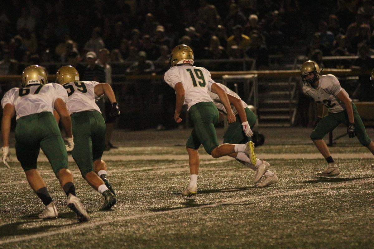 Lucas Karwal '18 runs towards the ball during a kickoff after West scored on Friday, Aug. 25.