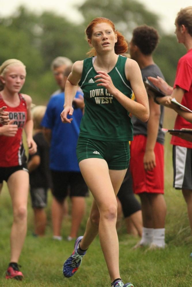 Claire Ronnebaum '18 begins her second mile in the girls varsity race. She placed 14th with a time of 21:16.