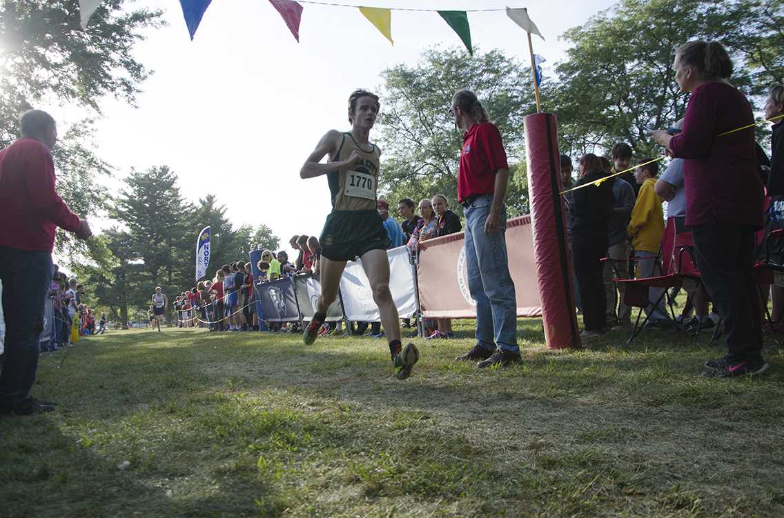Hunter Bagan 19 finishes the race at the Cedar Rapids Invite at Noelridge Park on Sept. 7.