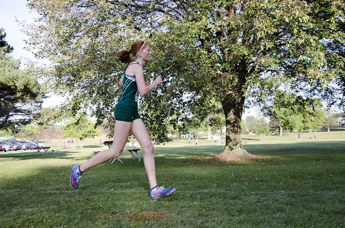Claire Ronnebaum 18 runs in the Cedar Rapids Invite at Noelridge Park on Sept. 7 where she would place 5th with a time of 21:35. 