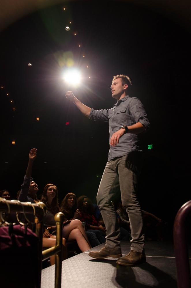 Asking for volunteers, magician Nate Staniforth gets ready to perform another illusion on Sept. 11 at the Englert Theatre for the Green Room in a class about wonder.