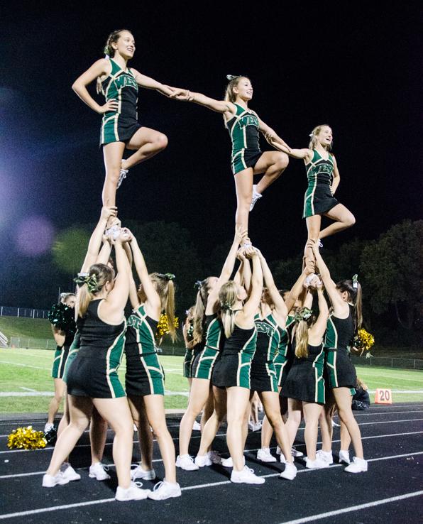 West's cheerleaders perform a stunt to boost the crowd's spirit.