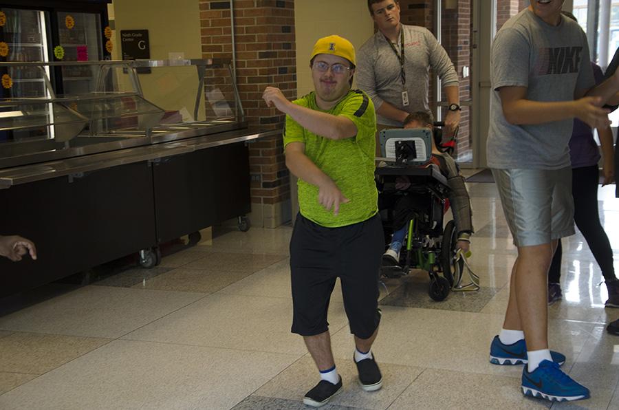 Ivan Cross 18 dances to the music in the freshman commons on Wednesday at the Best Buddies ice cream social.