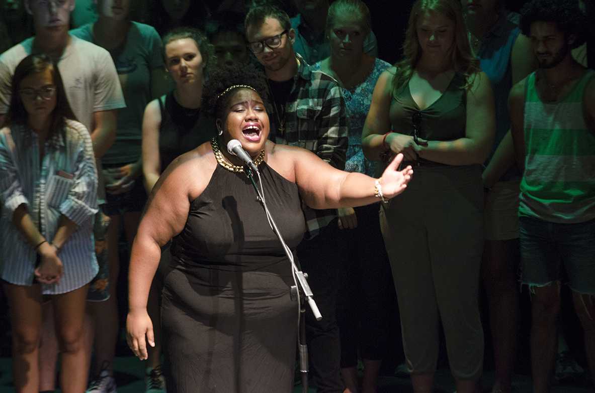 Tempestt Farrar, a University of Iowa student, sings at the first Green Room class on Aug. 28 at the Englert Theatre.