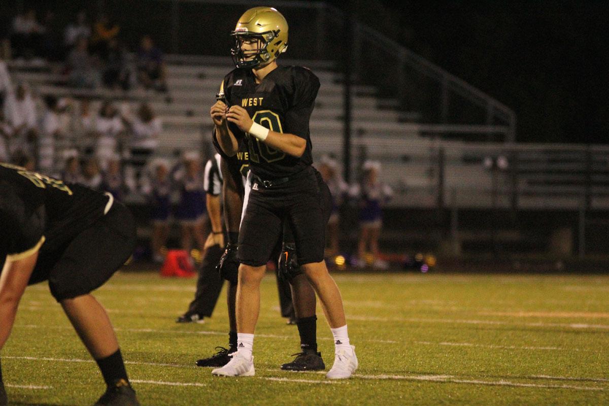 Evan Flitz '18 calls for the ball to be snapped on Friday, Sep. 1.