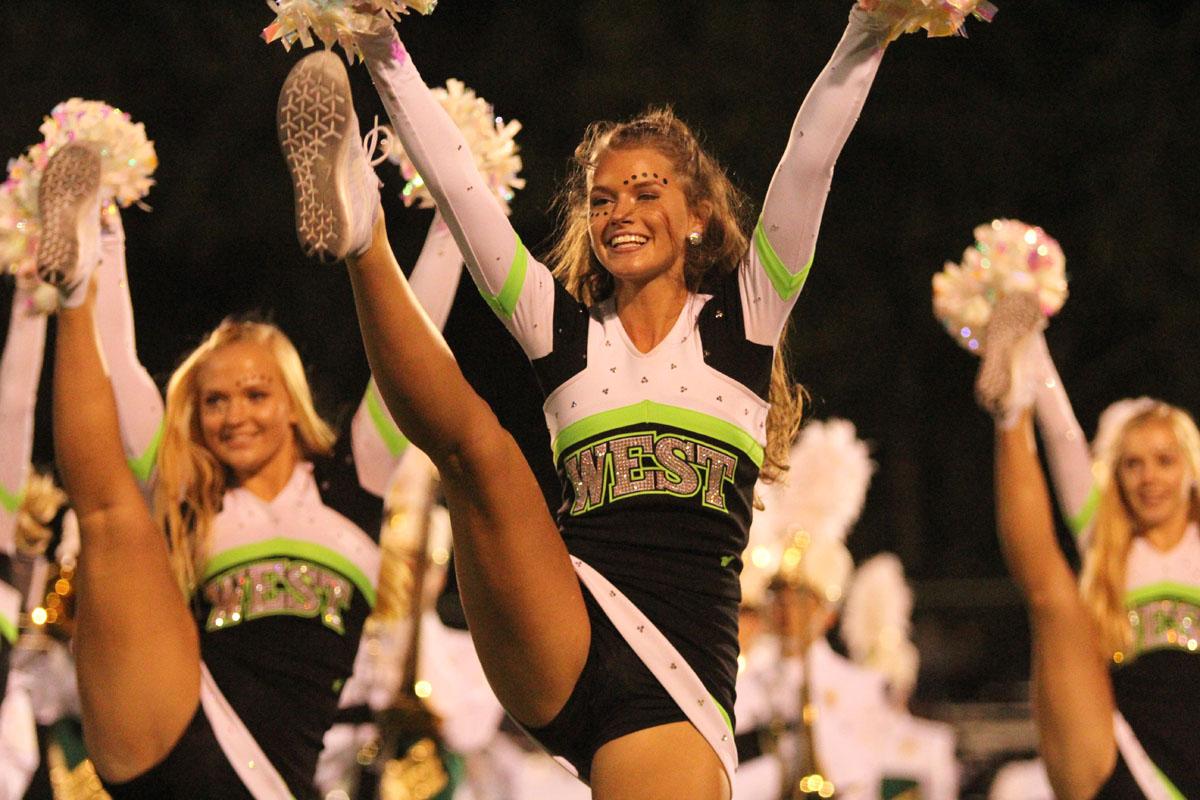 Rylee Petitgout '18 performs during the poms' halftime routine on Friday, Sep. 1.