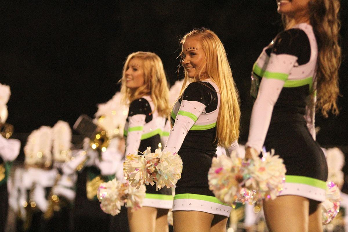 Addie Schroeder '19  dances during the poms' halftime routine. 