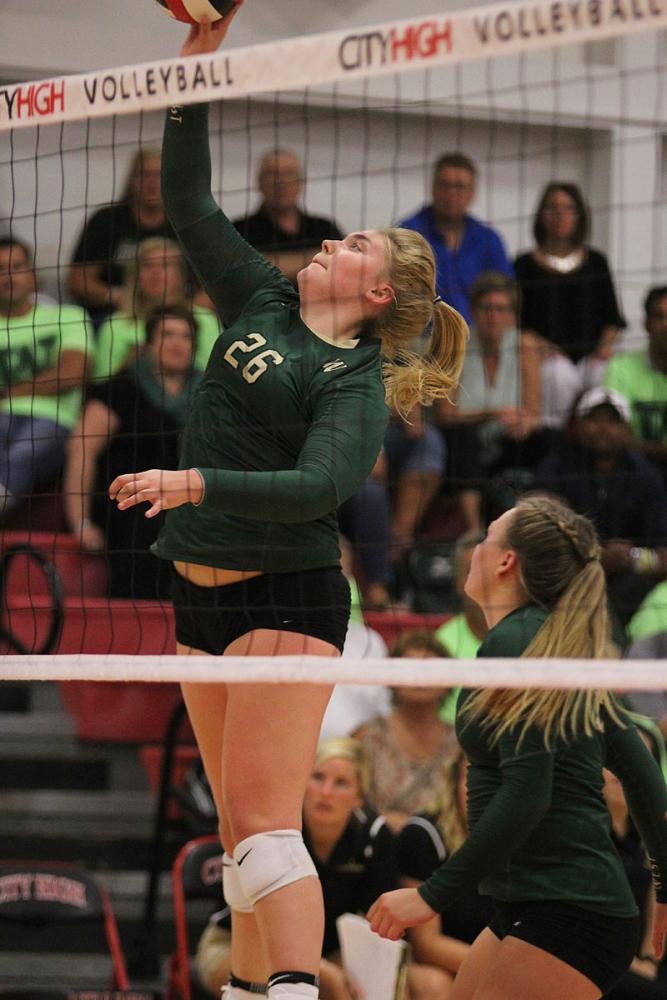 Colby Greene '18 spikes the ball on Tuesday, Sept. 5.