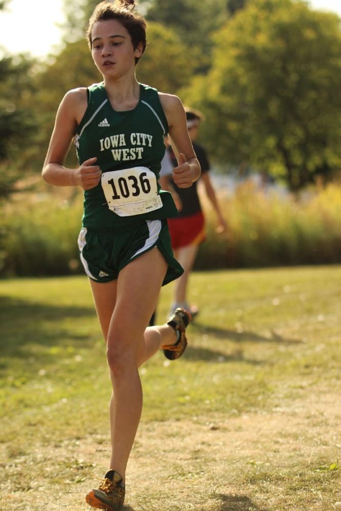 Kiara Malloy-Saldago '21 runs towards the second mile. She placed 21st with a time of 20:06 on Thursday, Sep. 7.