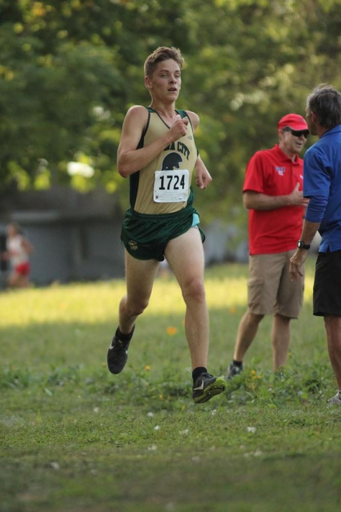 Micah Bailey '18 runs down towards the finish line. He placed 70th with a time of 18:08 on Thursday, Sep. 7. 