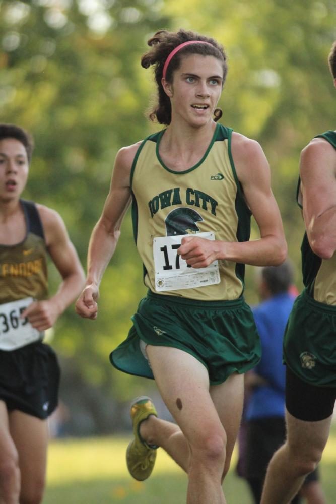 Daniel Neese '18 passes Ian Prescott '19 to earn 80th place with a time of 18:20 on Thursday, Sep. 7. 