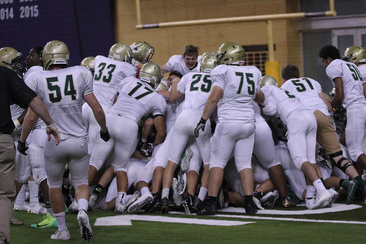 The team dog piles on top of each other in celebration after they won on Friday, Sep. 8.